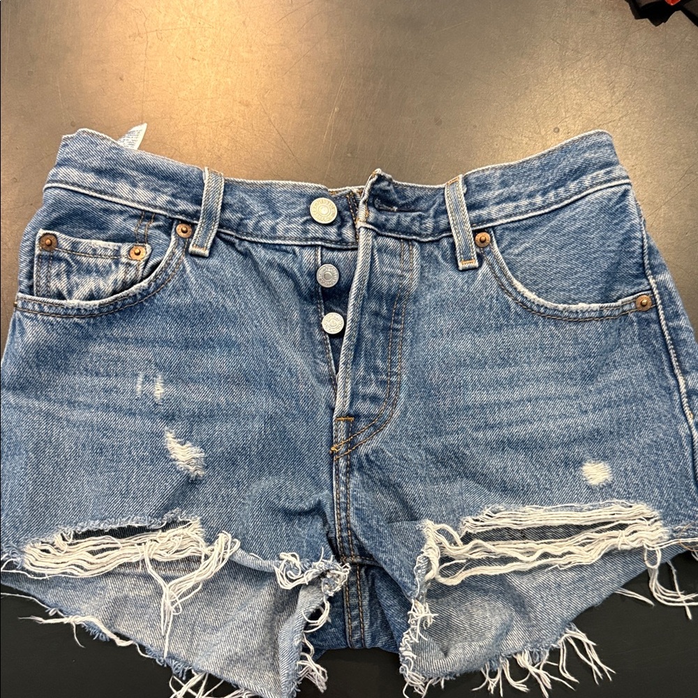 Levi's 501 cutoff Light Blue Distressed Jean Shorts
W25
